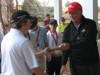Rome junior golfer Jonathan Bryan receives his top five plate from U.S. Kids Atlanta Tour Director John Godwin.